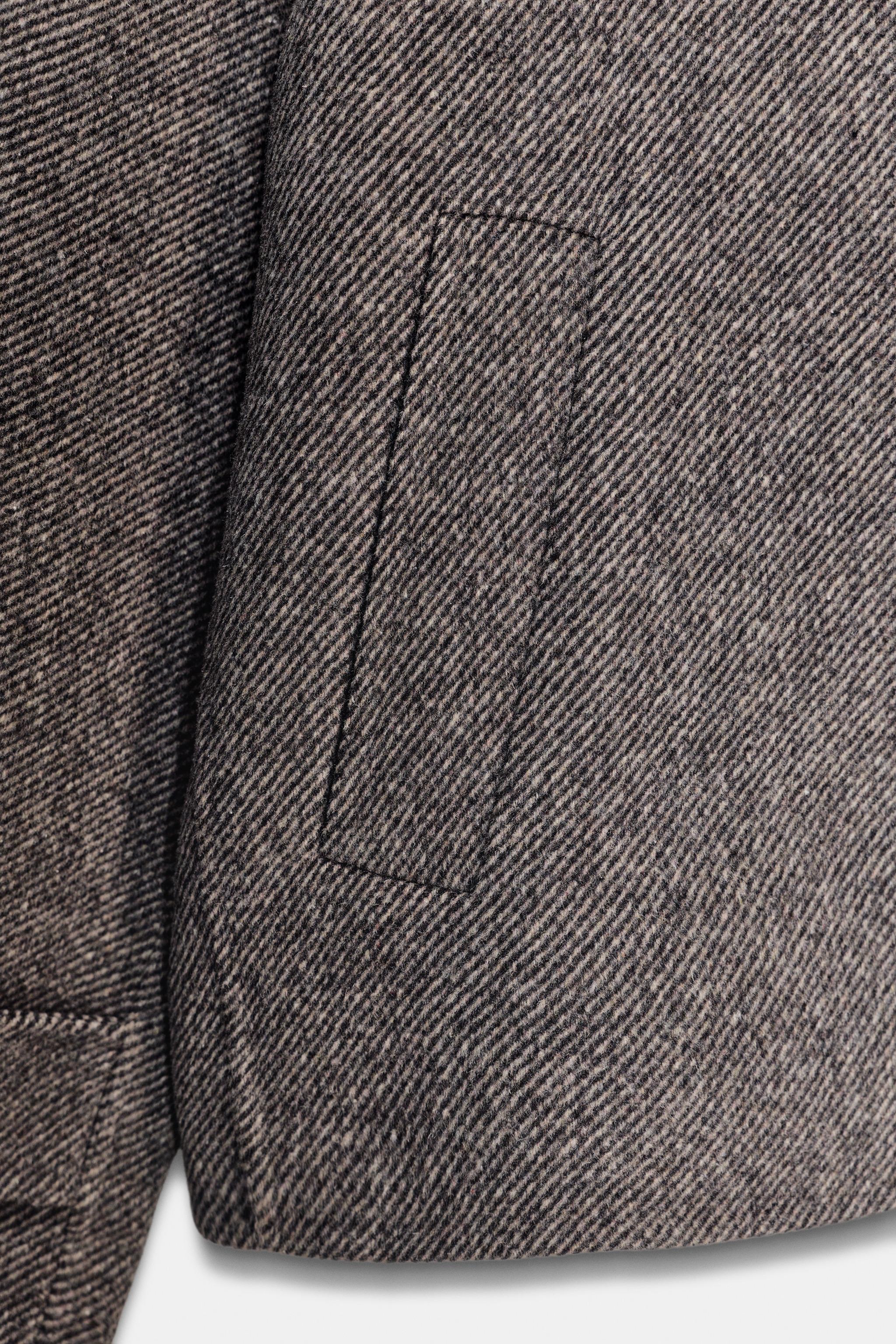 MANTEAU COURT AVEC LAINE
